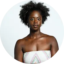 Headshot of woman with natural afro hair